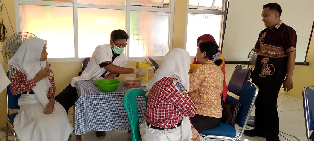 Pencegahan Kanker Serviks di SMP NEGERI 2 WONOSALAM dengan Vaksin HPV